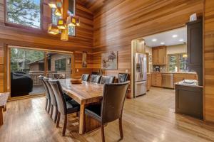 Forested getaway with kitchen stone fireplace pool & private hot tub
