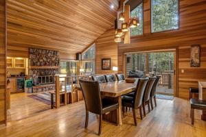 Forested getaway with kitchen stone fireplace pool & private hot tub