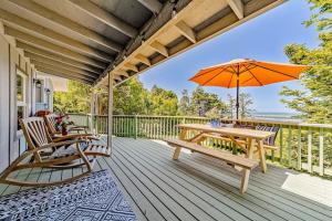Charming coastal home with water views large covered deck
