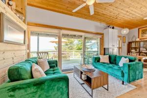 Charming coastal home with water views large covered deck