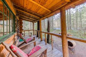 Historic riverfront Steiner cabin in forest with firepit deck & patio lounging