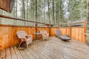 Historic riverfront Steiner cabin in forest with firepit deck & patio lounging
