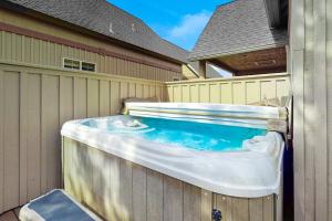 Inviting chalet with private hot tub grill 3 pools hot tub gym & tennis
