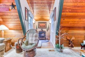 Adorable A-frame cabin withnearby river access game room wood stove firepit