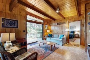 Unique lakefront cabin near the dunes with a private dock & fireplace
