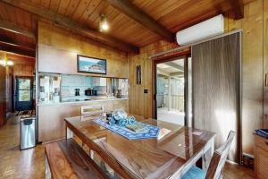 Unique lakefront cabin near the dunes with a private dock & fireplace