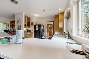 Forest-view home with fireplace deck - Walk to the Beach & Golf Course