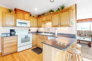 Dog-friendly oceanfront beach home with private hot tub and stunning ocean views