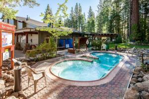 Rustic-chic condo with pool sauna hot tub tennis fireplace game room & deck