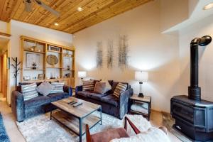 Modern retreat with wooden touches shared hot tub pool sauna basket & tennis