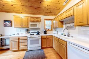 Modern retreat with wooden touches shared hot tub pool sauna basket & tennis