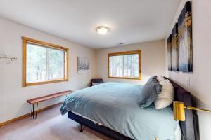 Modern retreat with wooden touches shared hot tub pool sauna basket & tennis