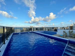 Flat Elegante c Piscina Rooftop e Vista Mar