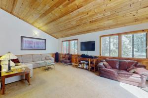 Rustic home with wood stove deck open floor plan & nearby activities