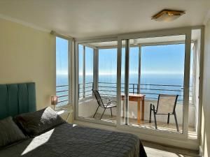 Escpectacular vista al mar y piscina climatizada