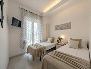 -A due passi dal mare- Wifi AC 4 posti Smart Tv