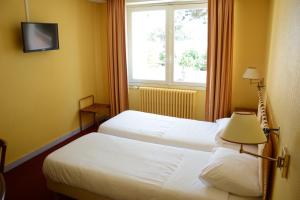 Hotels Logis Le Petit Trianon : photos des chambres