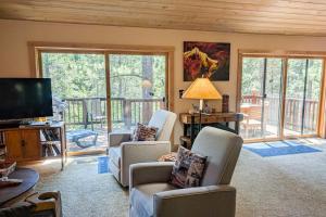 Spacious home with private hot tub & game room - near skiing hiking biking
