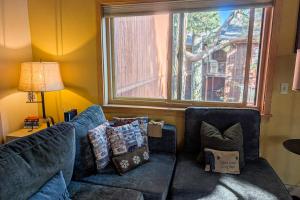 Spacious home with private hot tub & game room - near skiing hiking biking