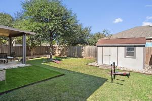 Leander Home with Shaded Backyard, Games and Grill