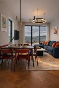 LUXURY WATERFRONT APARTMENTS WITH SEA VIEWS, SUNSET TERRACES and FREE PARKING, ONE WITH A HUUM SAUNA, THE OTHER WITH A BATHTUB