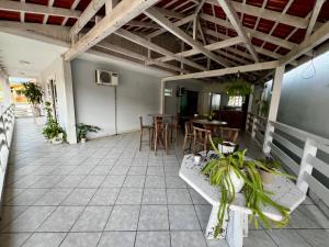Casa com churrasqueira e ar para até 8 pessoas