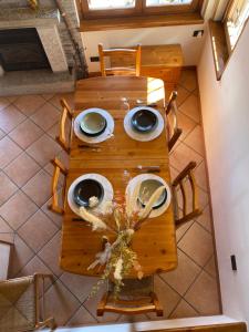 Casa dello Scoiattolo immersa nel verde con vista lago