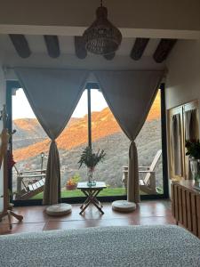 Cabaña con vista a la montaña