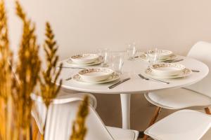 Taikos IV Apartamentai