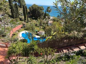 La Amapola, a Little Oasis with Sea View, Pool & Terrace in Nerja