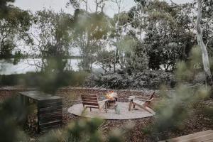 Numie White Gum Cocoon with Hot Tub Waterfront