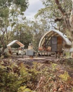 Numie White Gum Cocoon with Hot Tub Waterfront