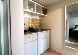 janu-homes - 1 Zimmer Apartment - 2 Betten, Kirchblick vom Kirchplatz