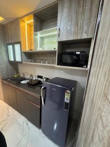 Sky Lodge Private Skyline Studio, Gaur City