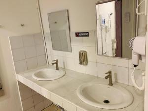 SPOT ON 89900 Jesselton Capsule Inn