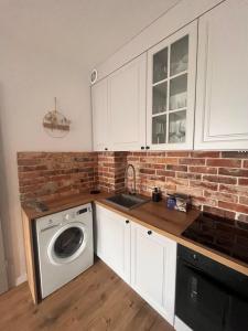 Sunset Wood Resort with Jacuzzi by Downtown Apartments