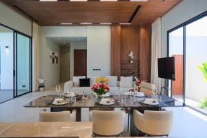 Modern Luxury 4BR Pool Villa by the Sea E5