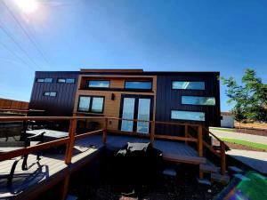 Seamless Comfort: Designer Modern Tiny Home featuringAmenities in Apple Valley, Utah