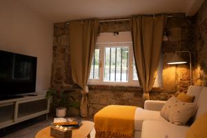 Apartamentos y Pensión El Campanu