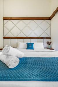 Gulmohar by Hottley - 2BHK Pool View Apartment