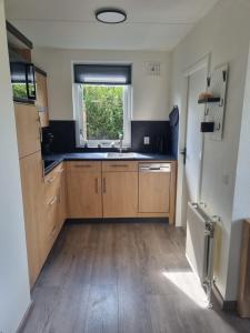 Woning met voorverwarmde, overdekte jacuzzi in de tuin