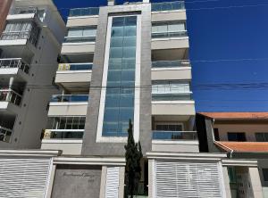 Residencial Luize 302 - Apto para 7 pessoas na Praia de Palmas a 350m do mar