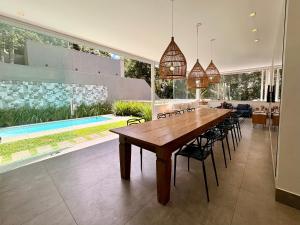 Casa 10 Floresta Boa Vista - Piscina Privativa, Adega e Conforto em 4 suítes