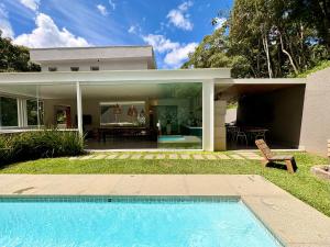 Casa 10 Floresta Boa Vista - Piscina Privativa, Adega e Conforto em 4 suítes
