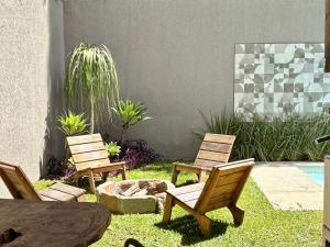 Casa 10 Floresta Boa Vista - Piscina Privativa, Adega e Conforto em 4 suítes