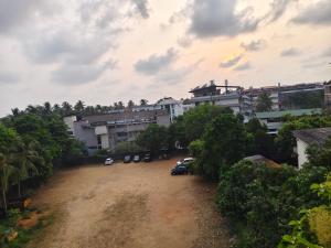 Harichandhanam Inn 100 meters from temple