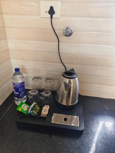 Harichandhanam Inn 100 meters from temple