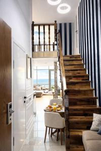 The Infinity Residence Elegant Duplex with Panoramic Sea View & Balcony