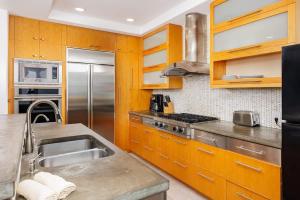 Beachfront Bliss • Rooftop Ocean Views 204 EOF B home