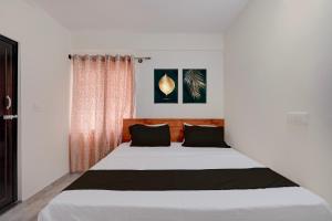 Hotel O SM Happy Stay ROOMS